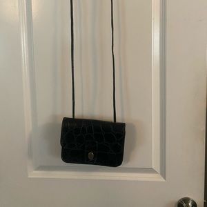 Women’s black purse.